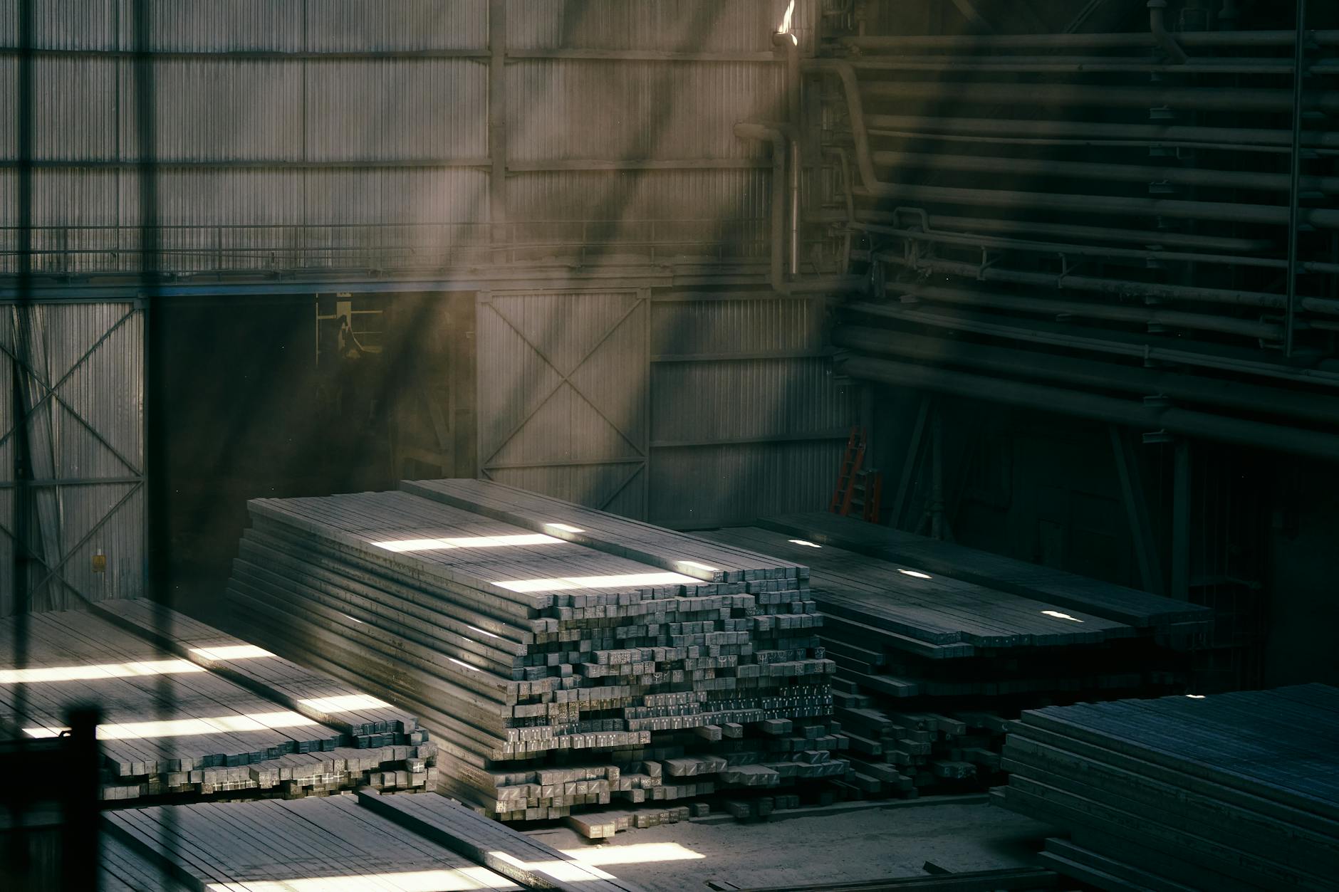 Steel construction beams and materials at industrial construction site