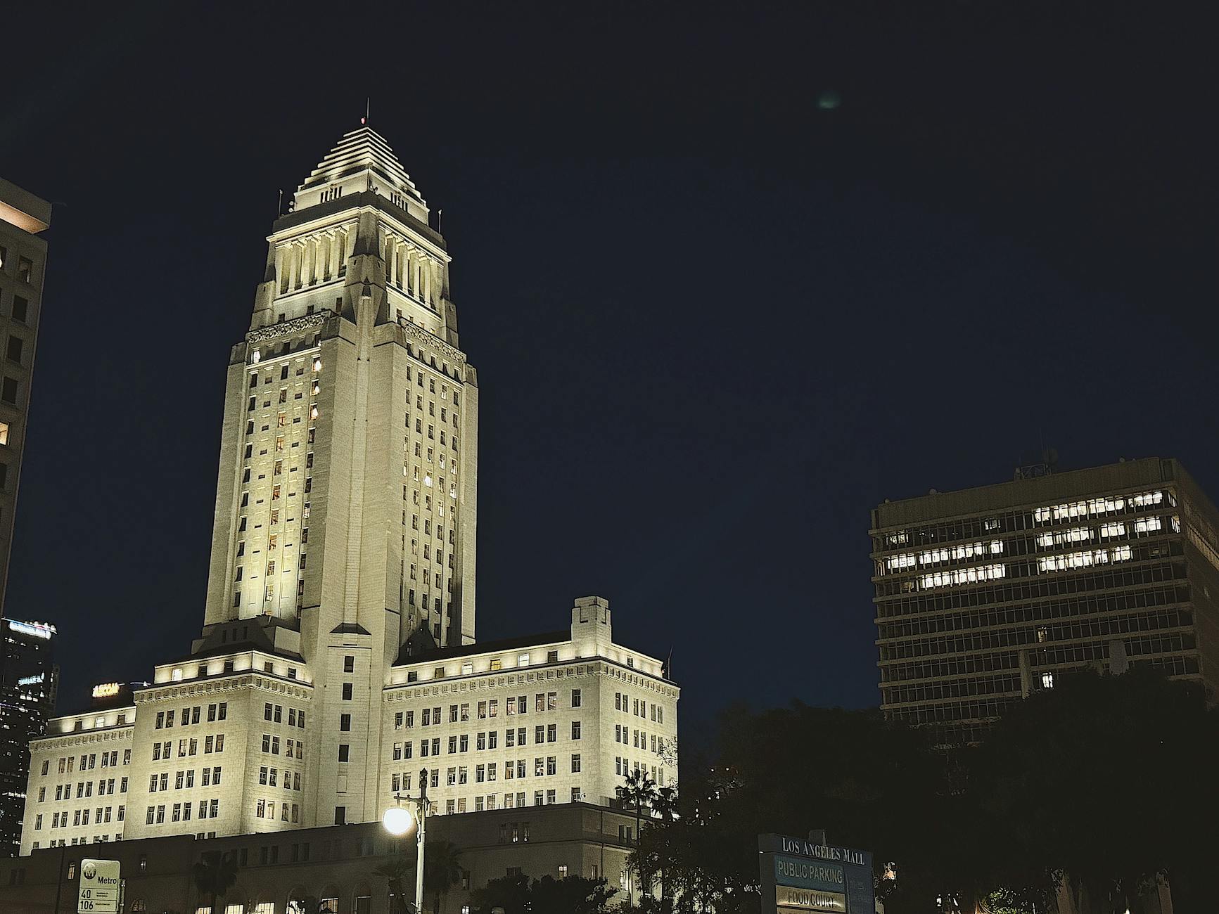 Modern city hall building representing local government authority over federal policies