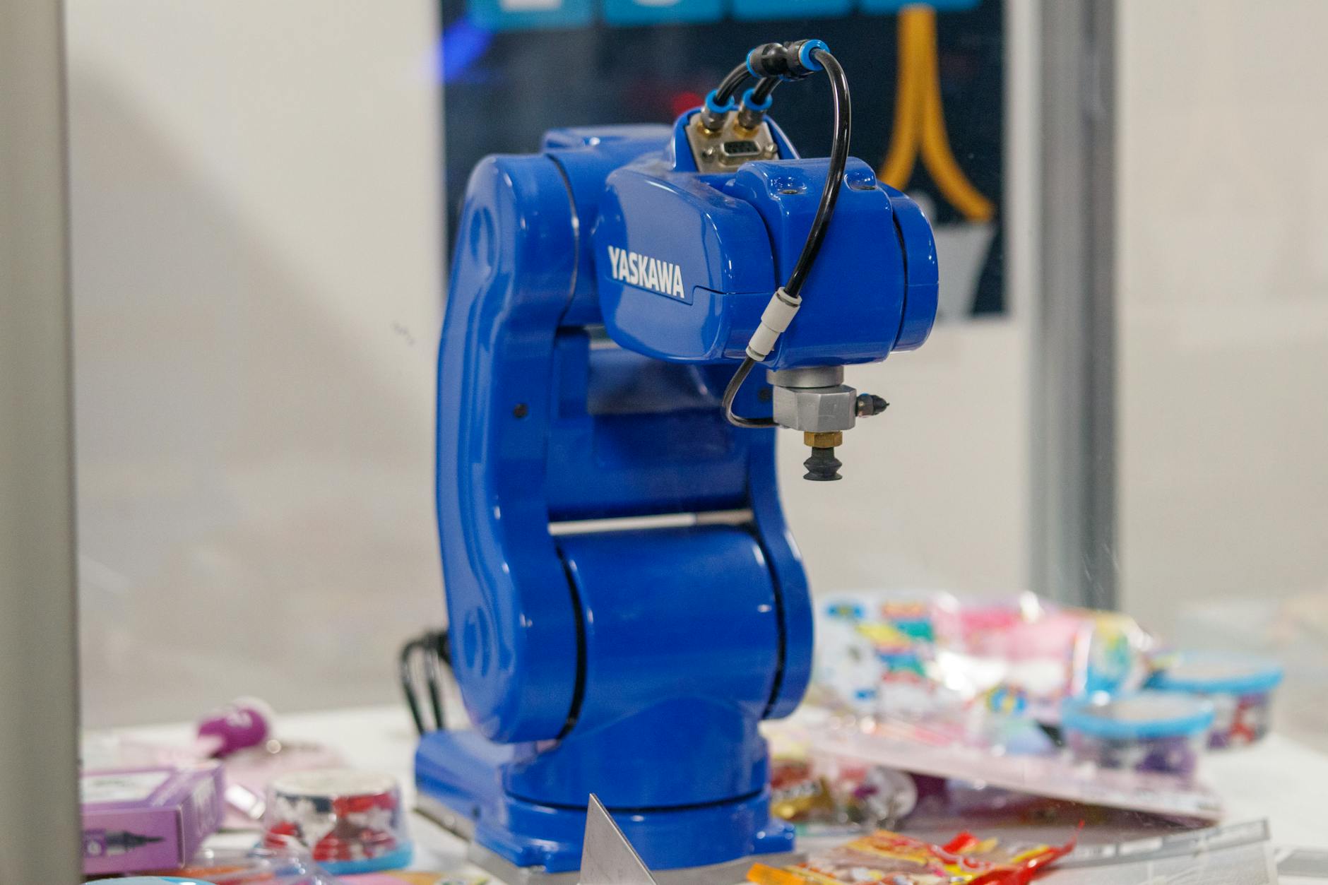 Automated warehouse facility with robotic systems handling inventory and packages