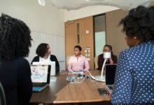 Business professionals meeting in modern office conference room