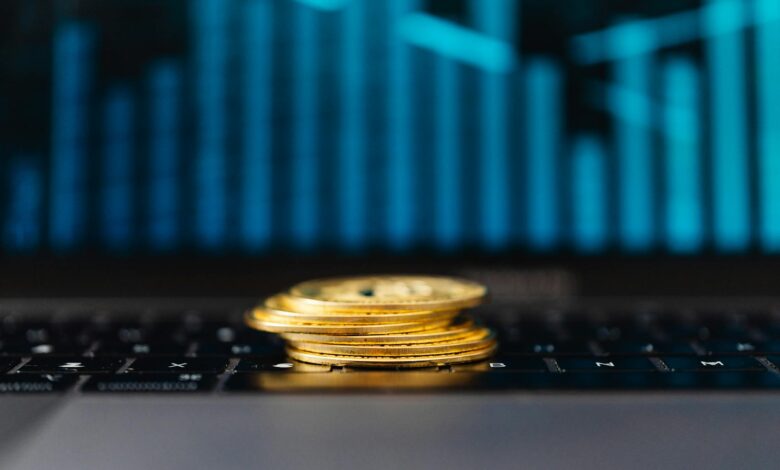 Stack of gold bars representing physical precious metal investments