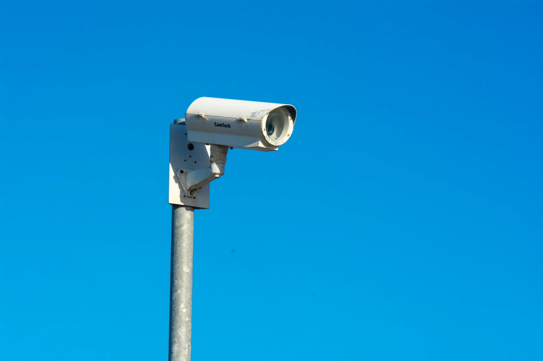 Modern security camera system mounted on building exterior for residential protection