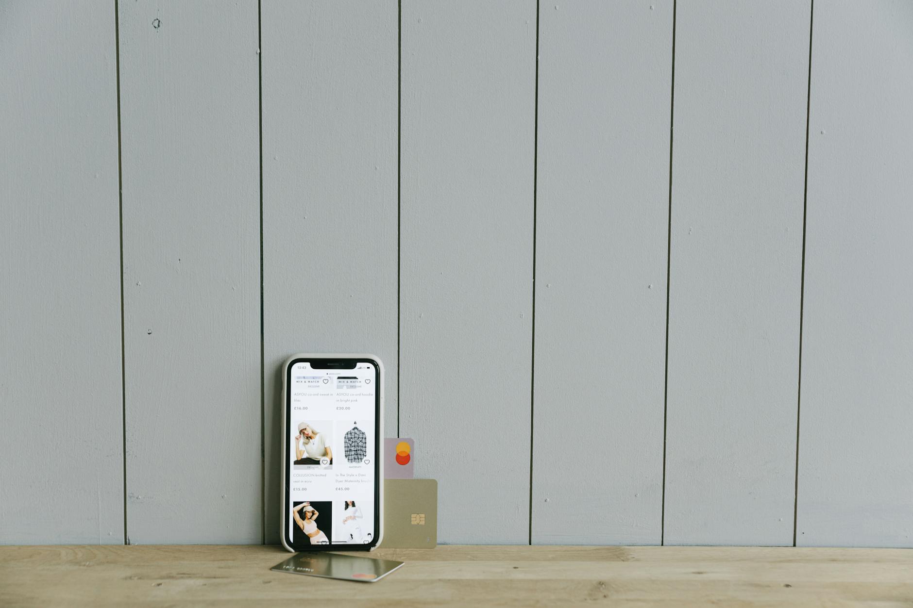 Person using smartphone for mobile banking and financial transactions