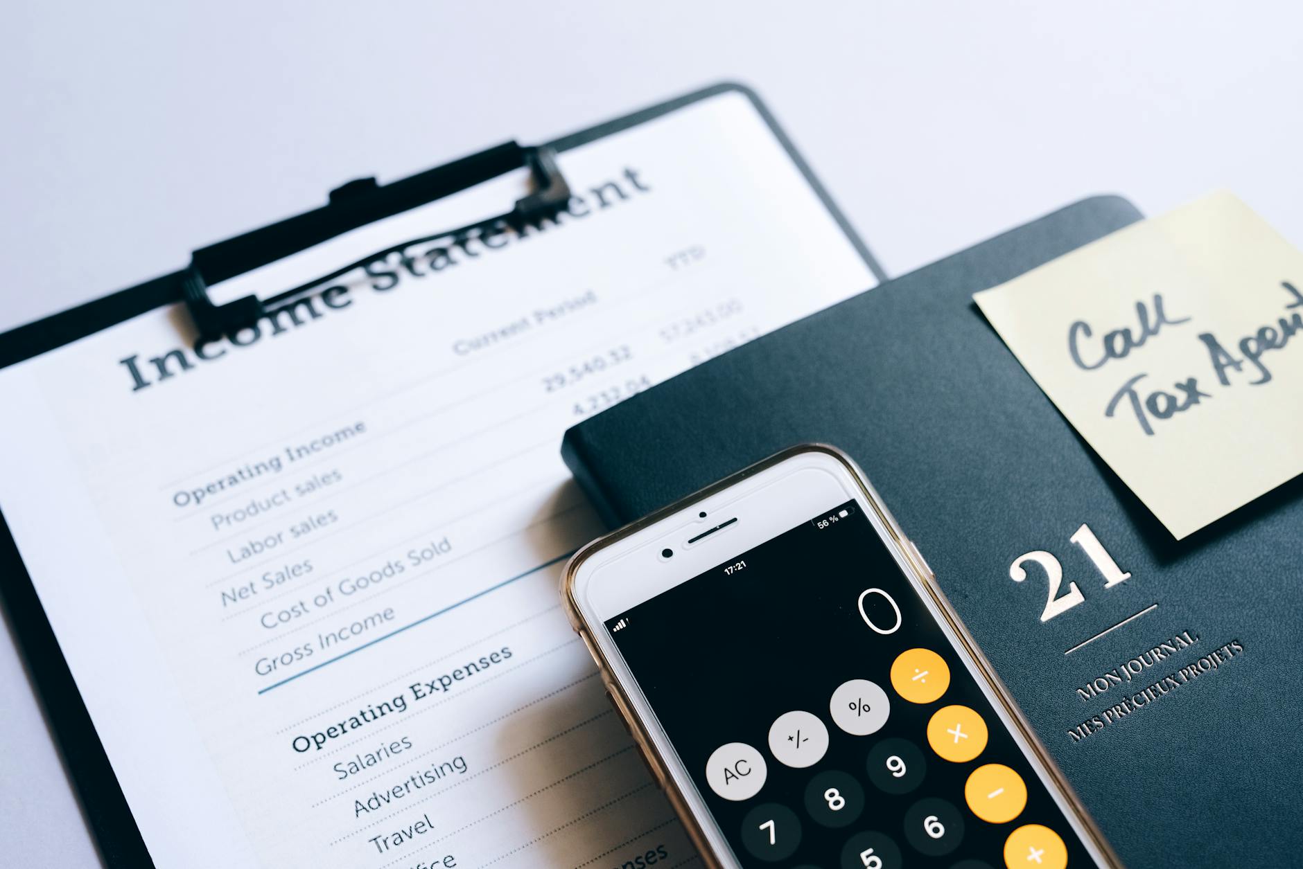 Financial advisor reviewing investment documents and wealth management strategies with clients