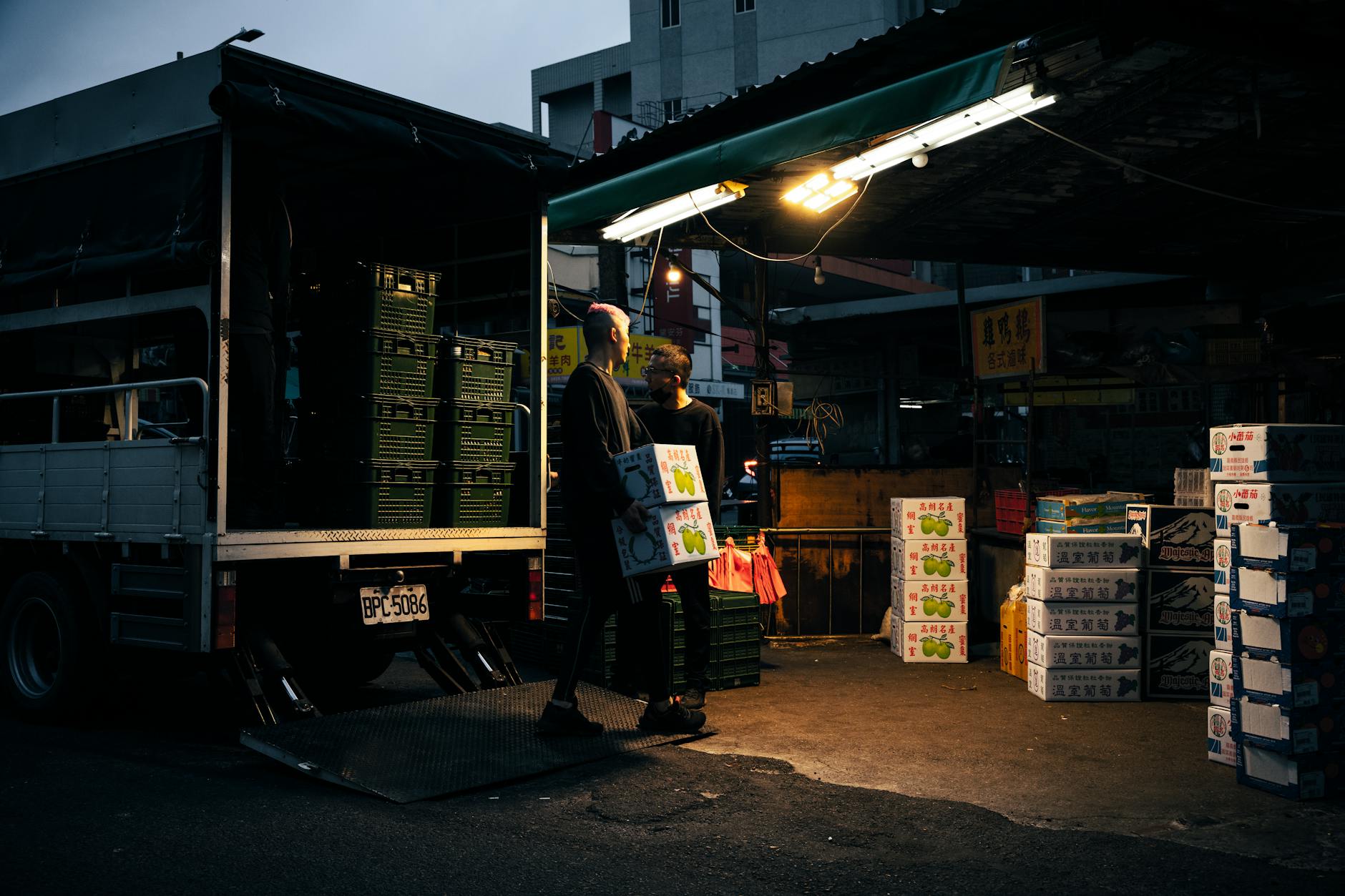 Warehouse workers managing inventory and logistics operations