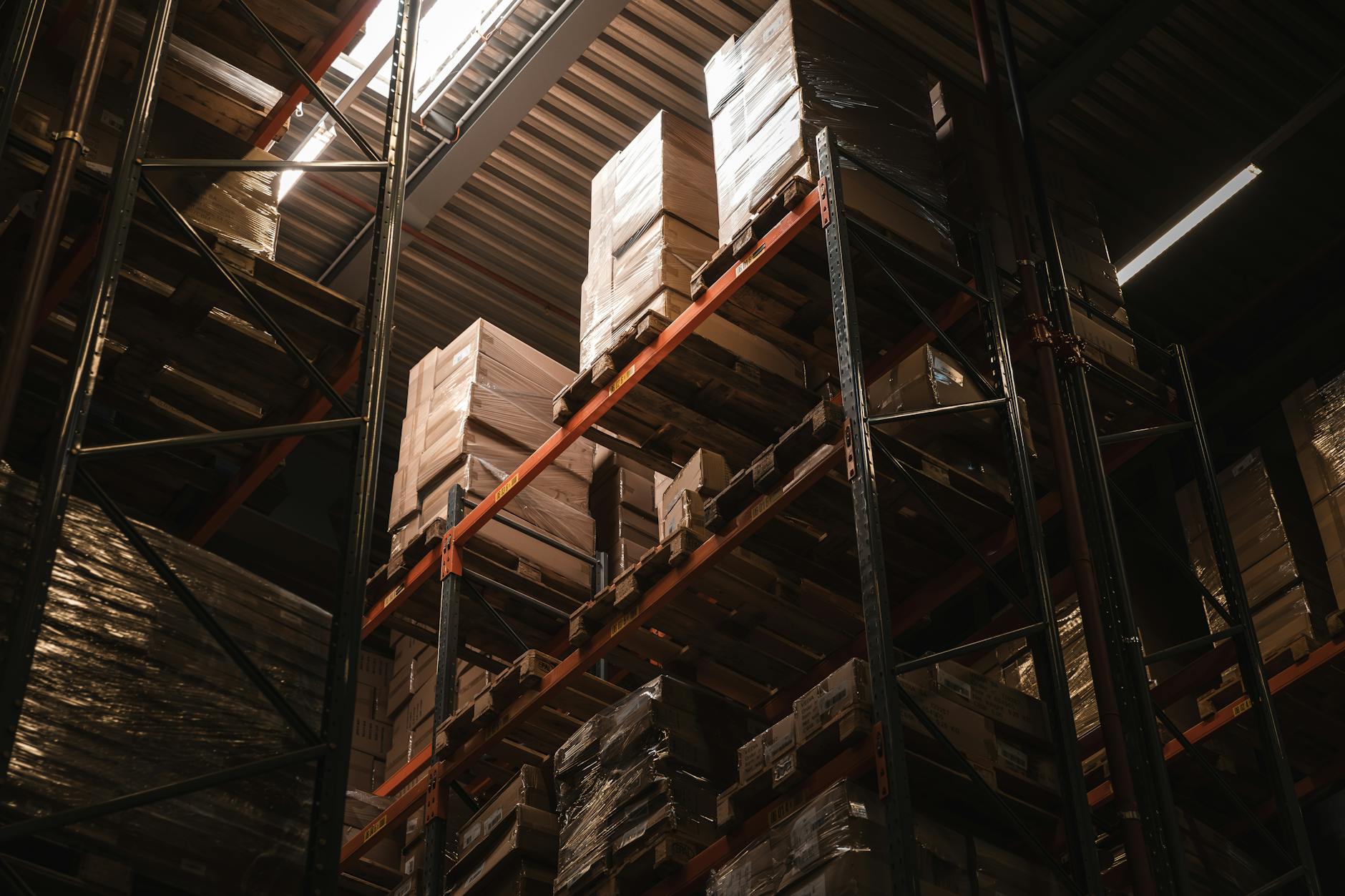 Industrial warehouse space with high ceilings and storage systems