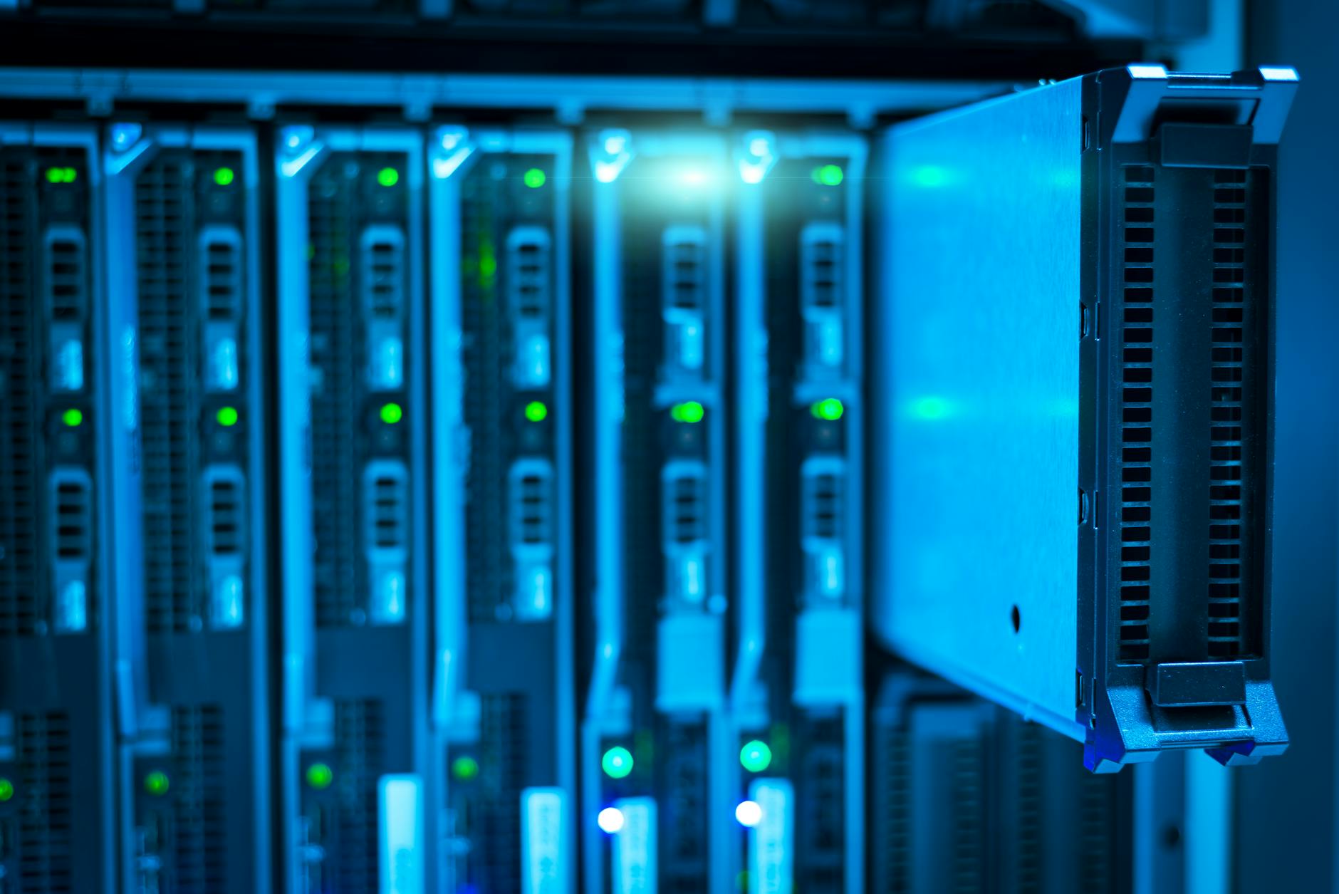 Modern data center with rows of server racks and technical equipment