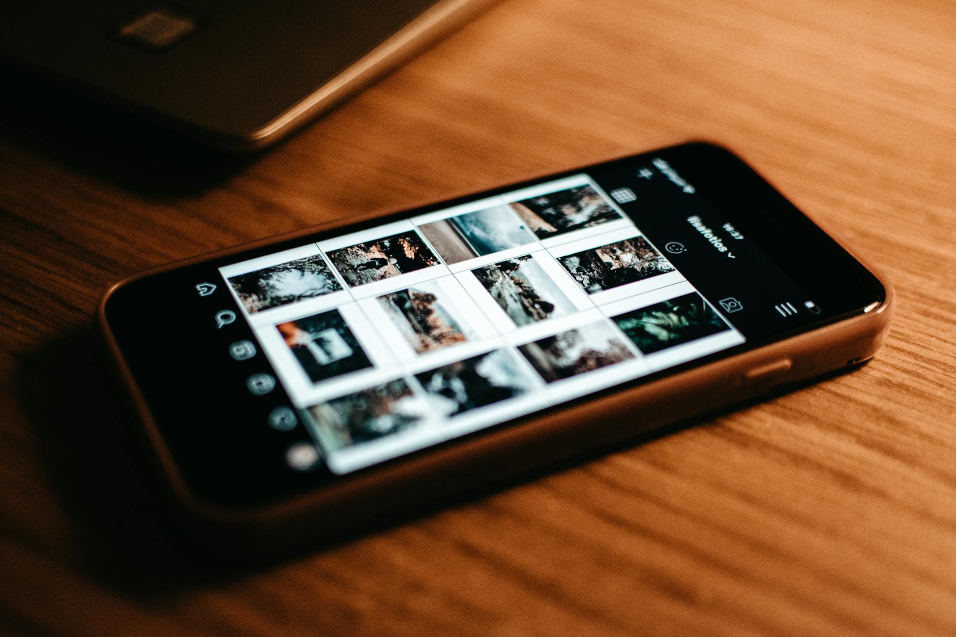 Person using smartphone displaying social media applications and feeds