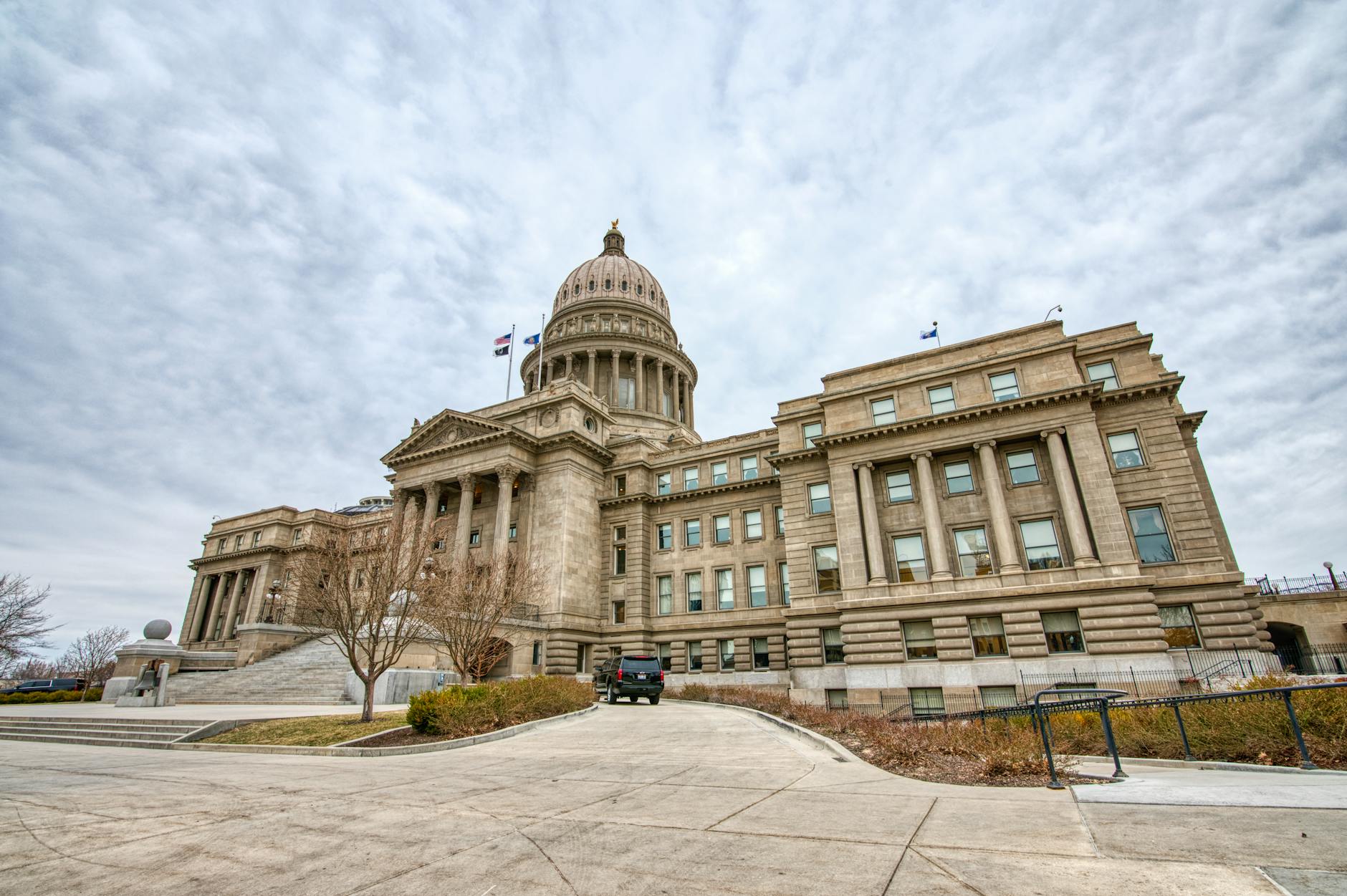 Federal government building exterior with American flag representing public service careers