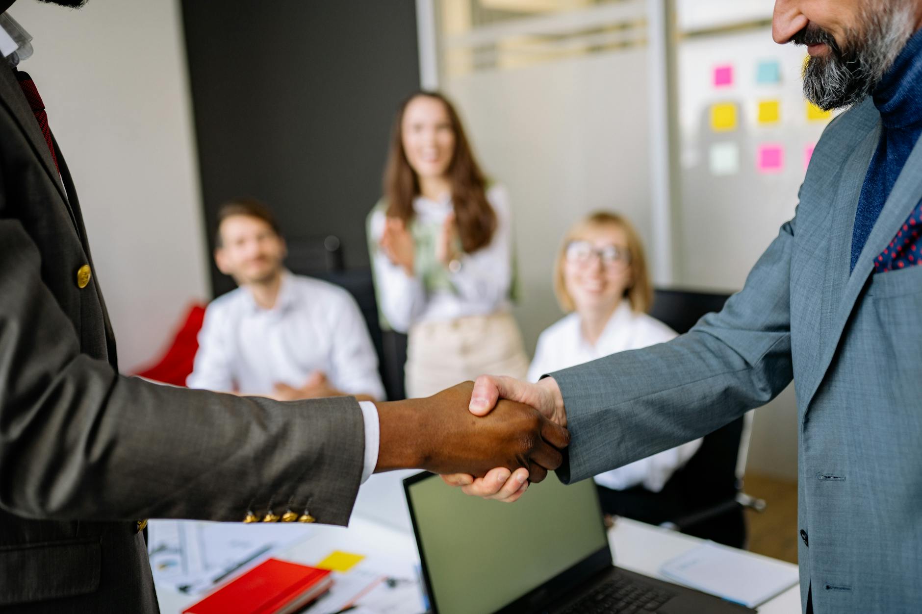 Professional business meeting discussing cryptocurrency custody services between bank representatives and clients