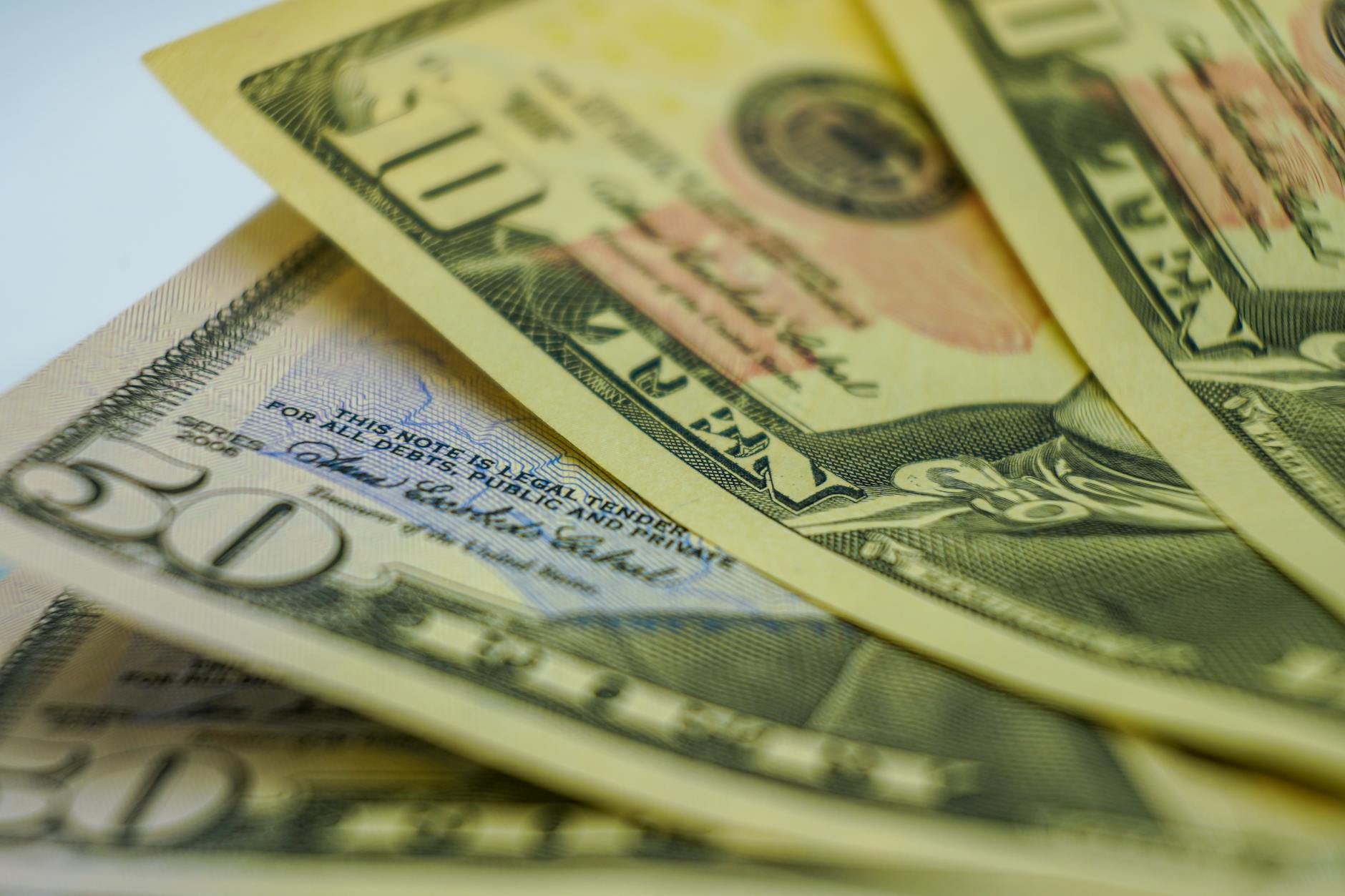 Stack of cash money representing all-cash home purchases