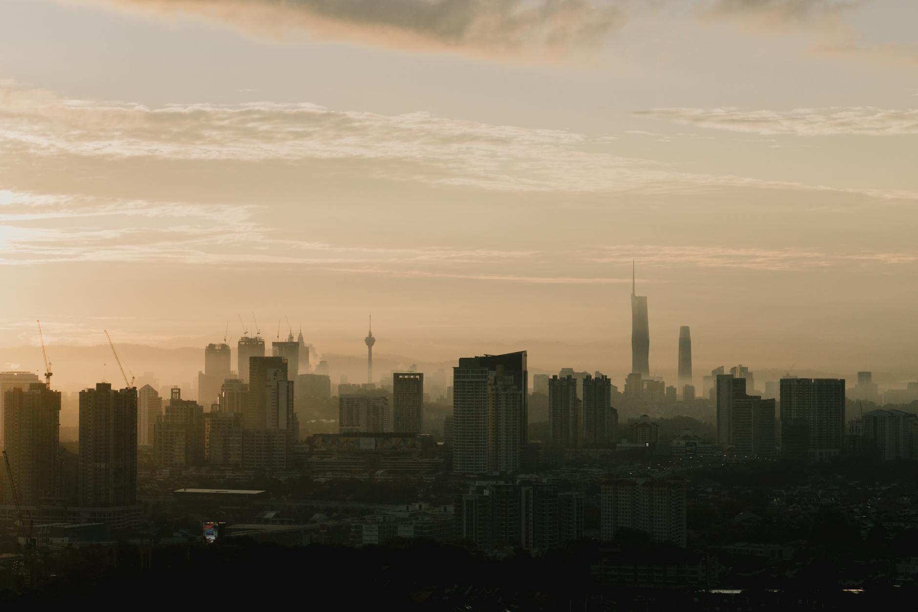 Urban business district skyline showing financial centers where advisory firms operate