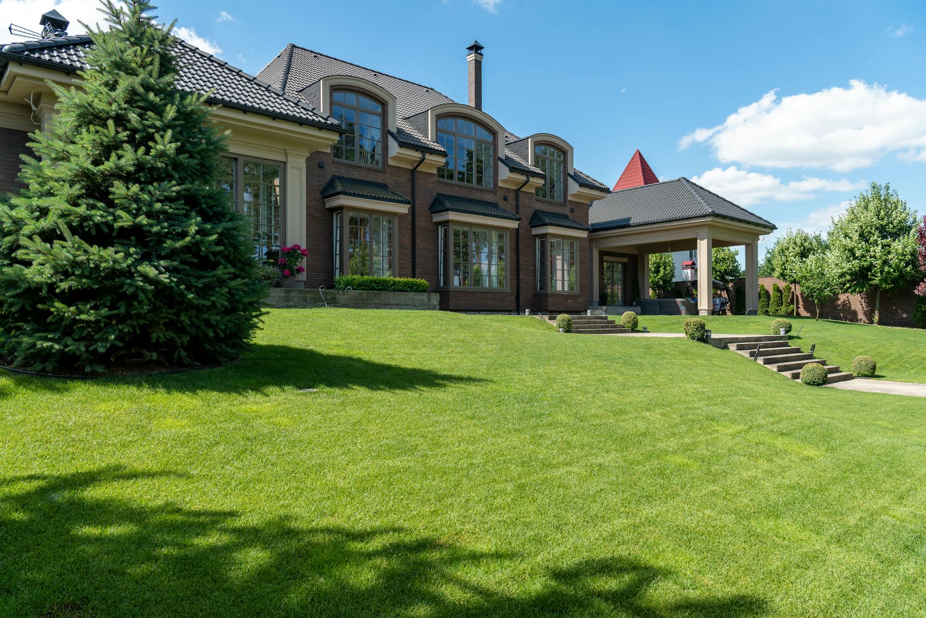 High-end security gate and fence system typical of the protective measures installed at billionaire Montana compounds