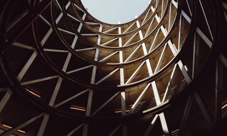Multi-level urban parking garage structure viewed from below
