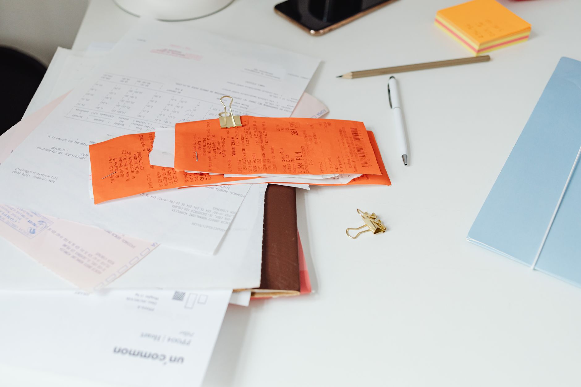Financial analyst reviewing structured credit documents at a desk