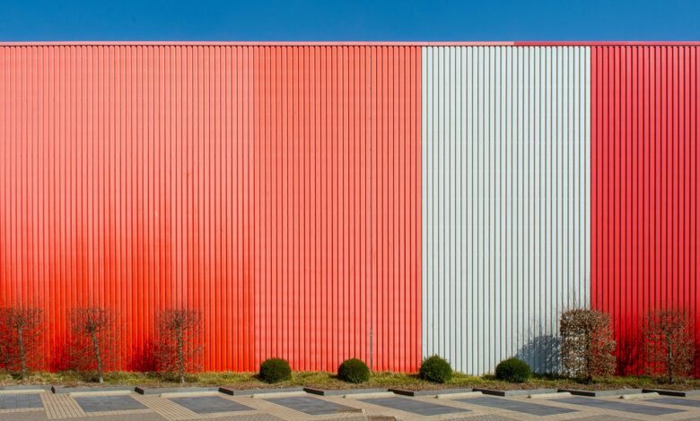 Exterior view of a large data center facility with power infrastructure