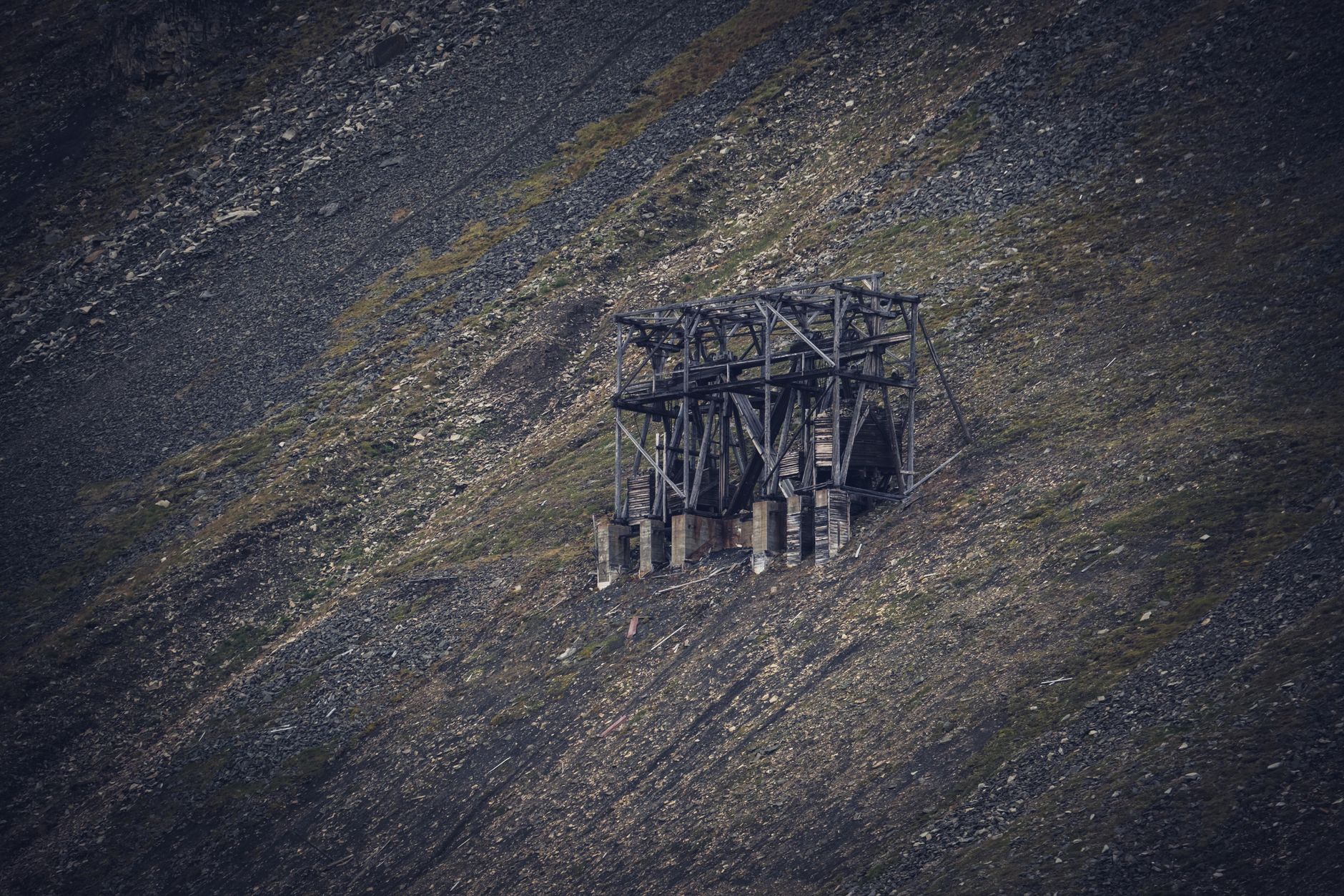 Open pit uranium mine with industrial equipment and exposed ore deposits