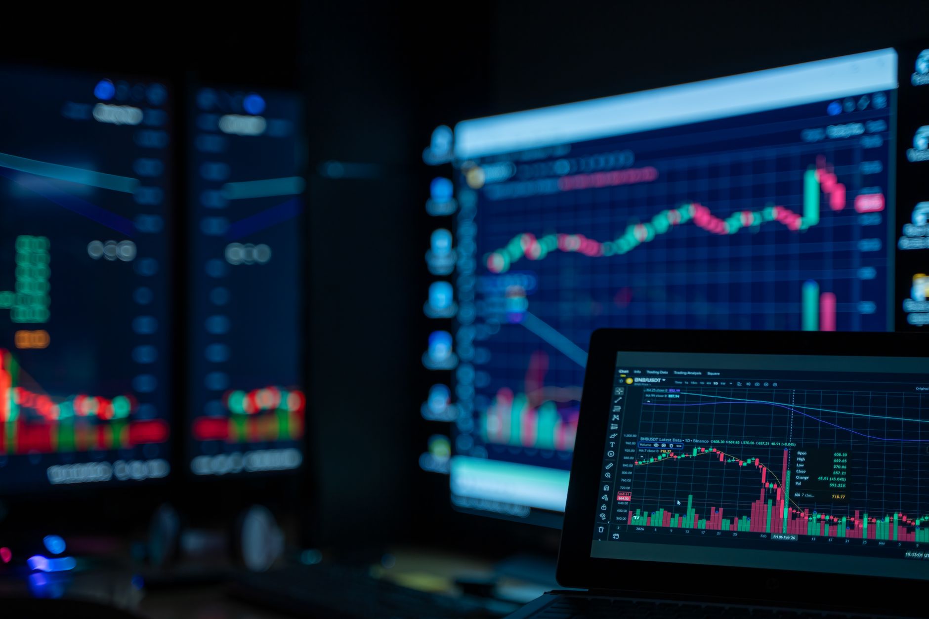 Financial professionals reviewing fixed income market data on trading screens