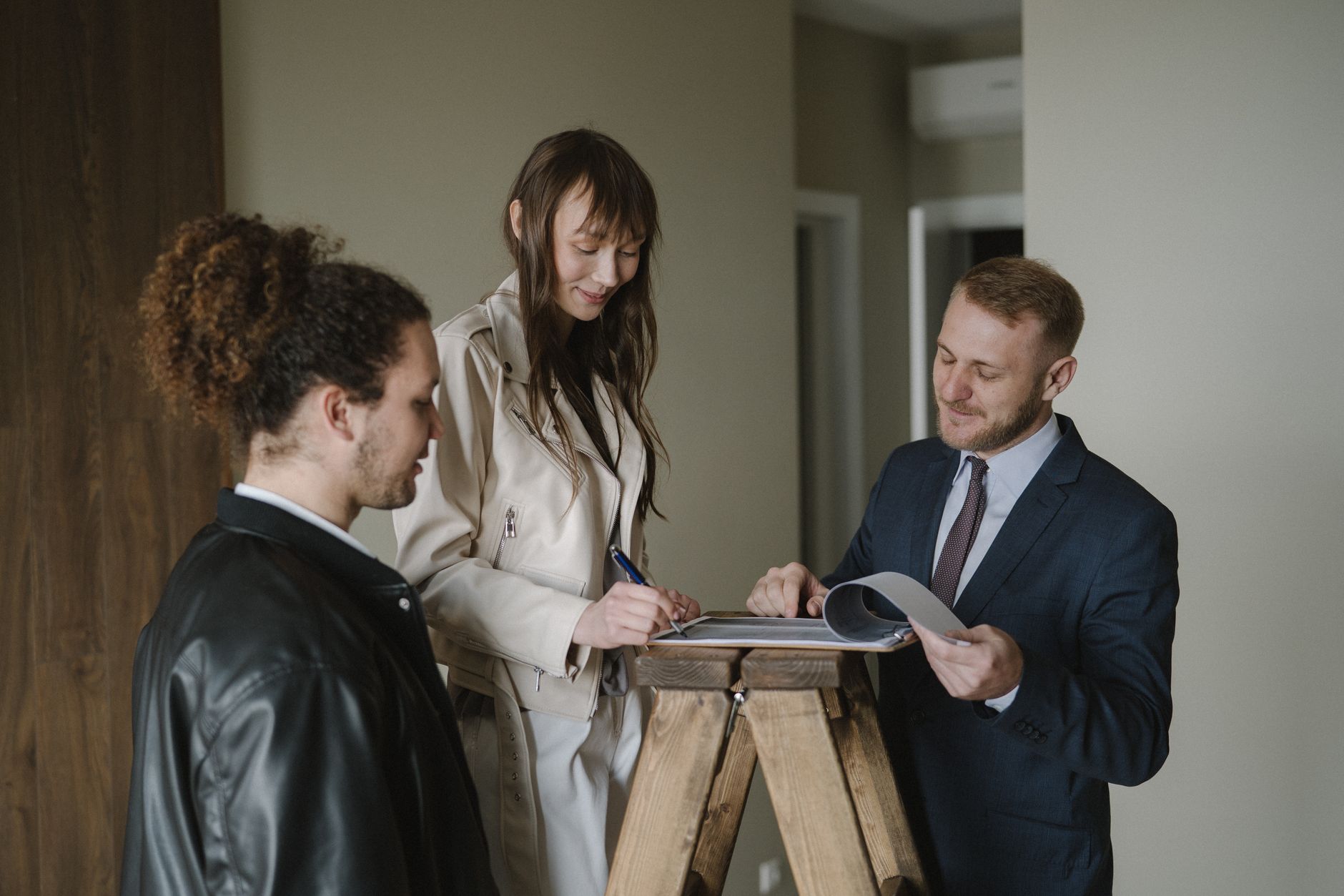 Real estate lease documents and financial paperwork on a desk