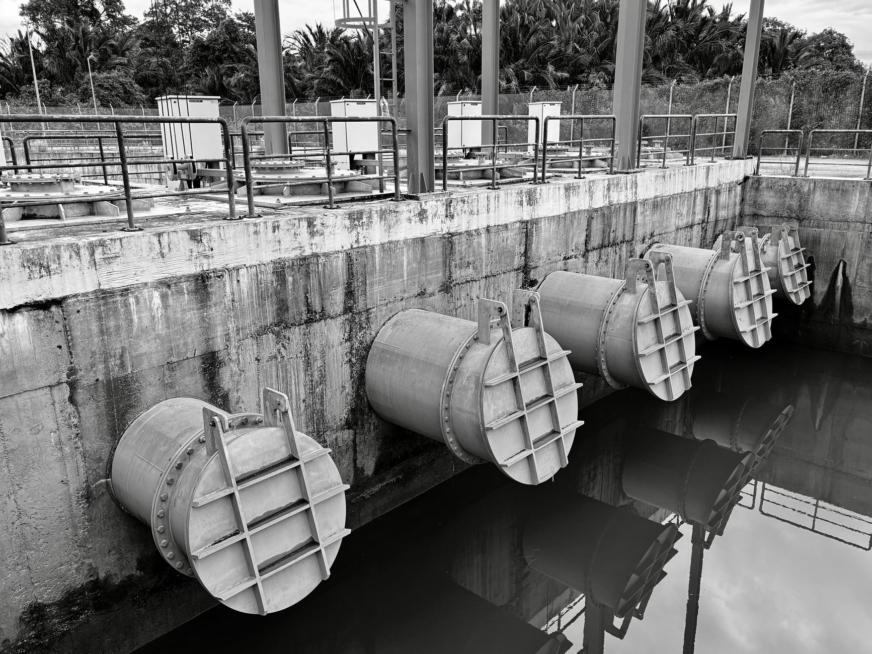 Aerial view of water treatment and distribution infrastructure serving an urban area