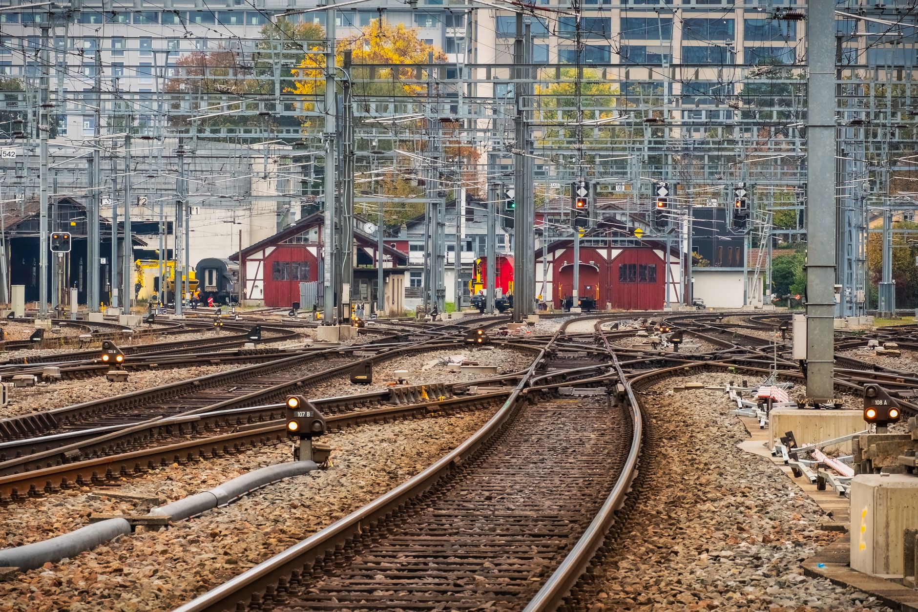 Wide shot of railroad tracks and infrastructure at an inland freight facility