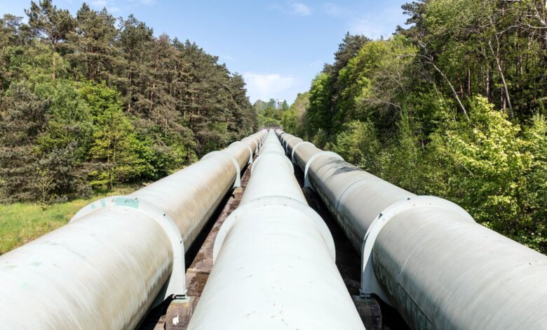 Natural gas pipeline compression infrastructure in an open field