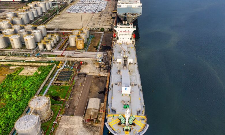 Large crude oil storage tanks at a coastal marine terminal facility