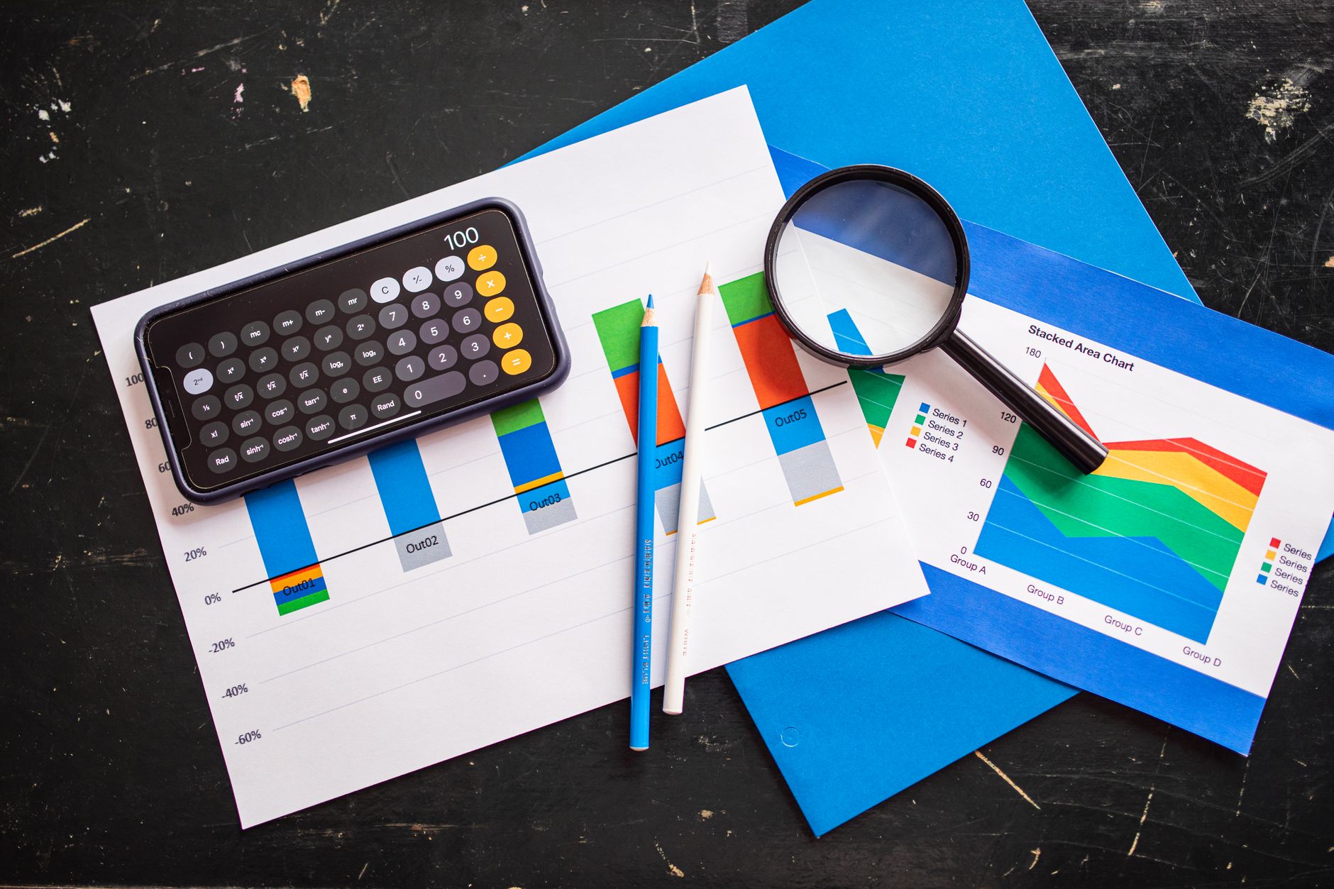 Financial analyst reviewing investment performance charts on a computer screen