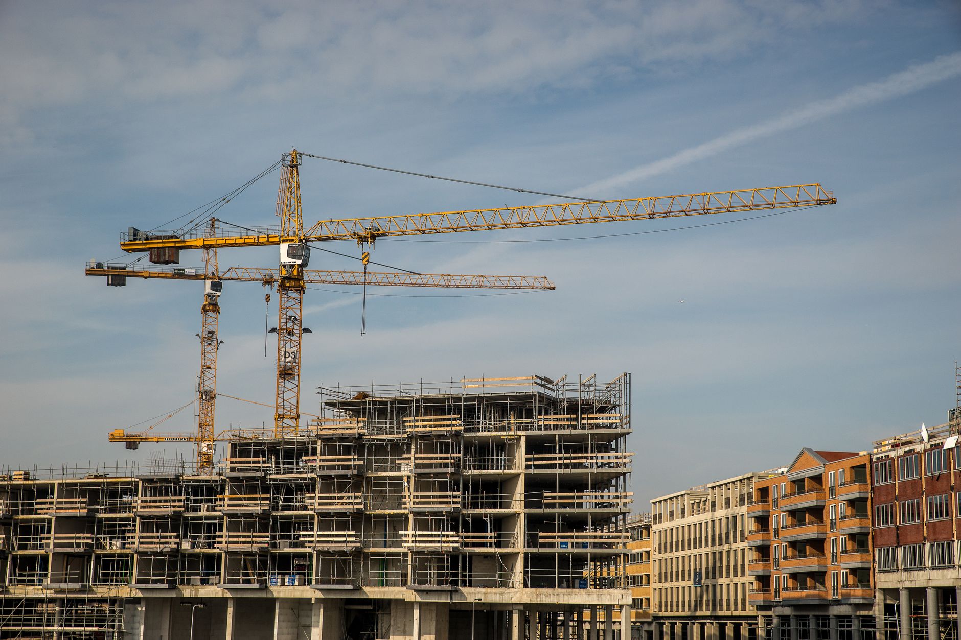 Business professionals reviewing infrastructure investment documents