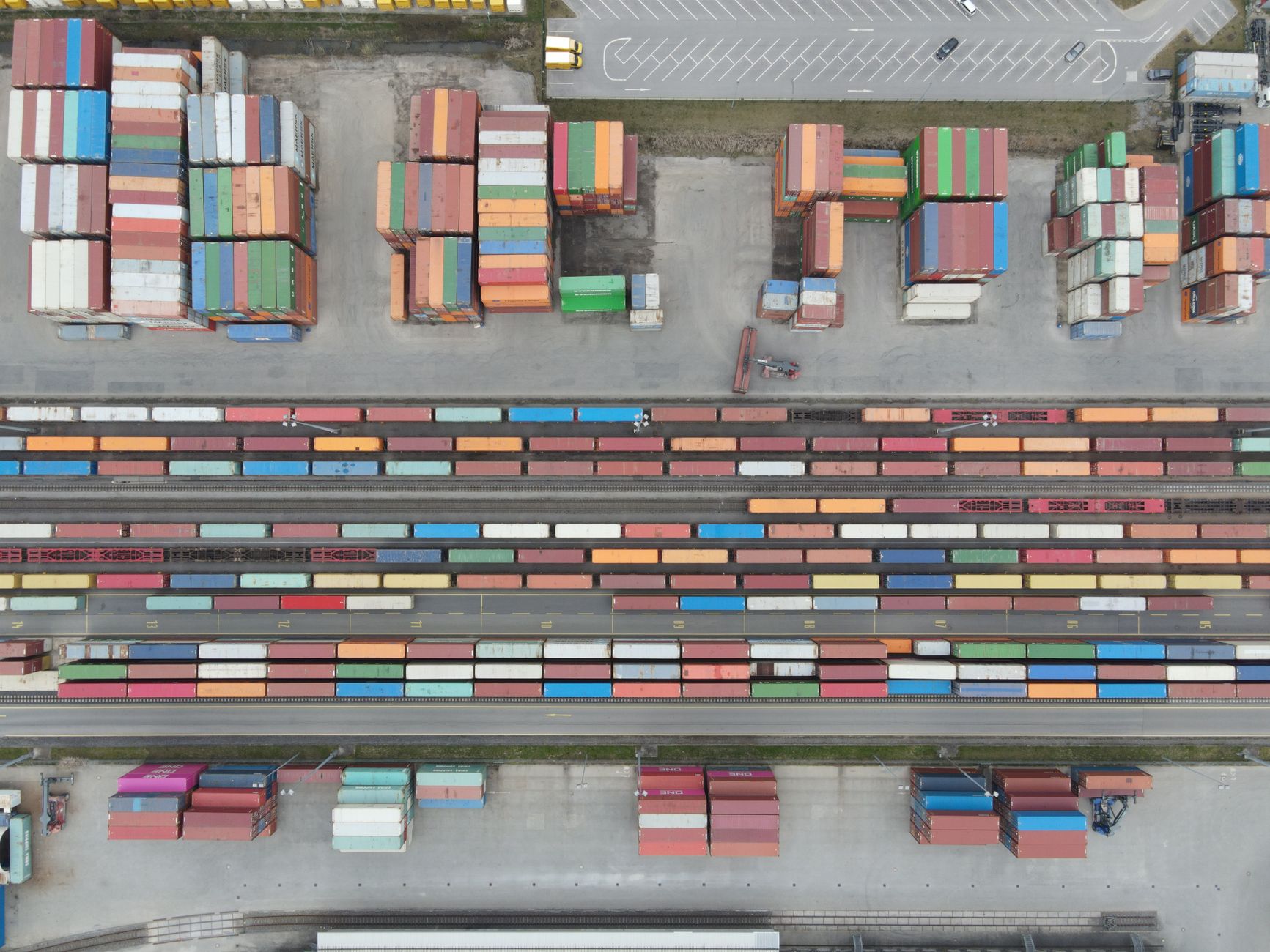 Aerial view of a commercial port with industrial infrastructure and tank farms