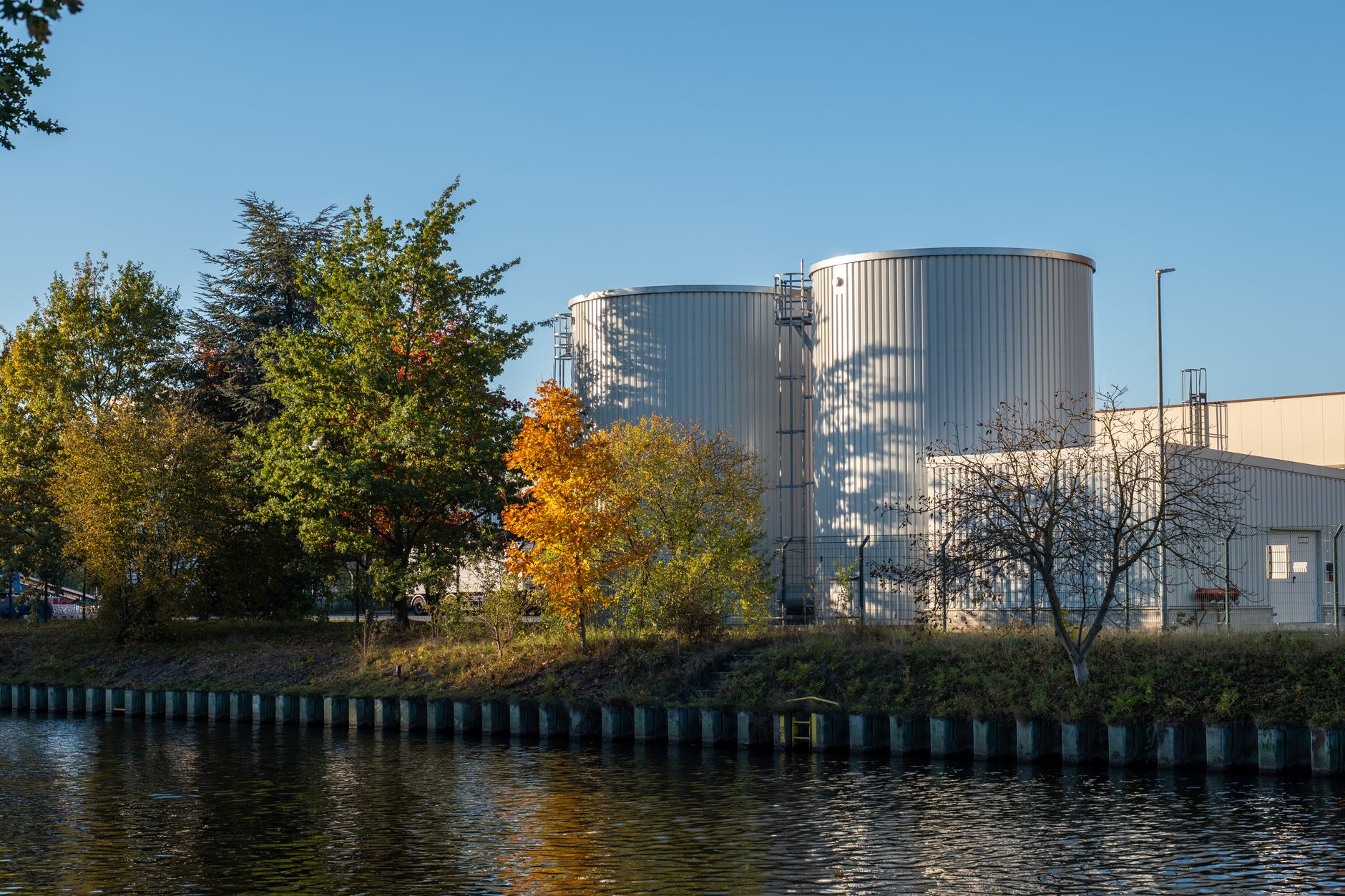 Industrial water storage and treatment tanks at an energy production facility
