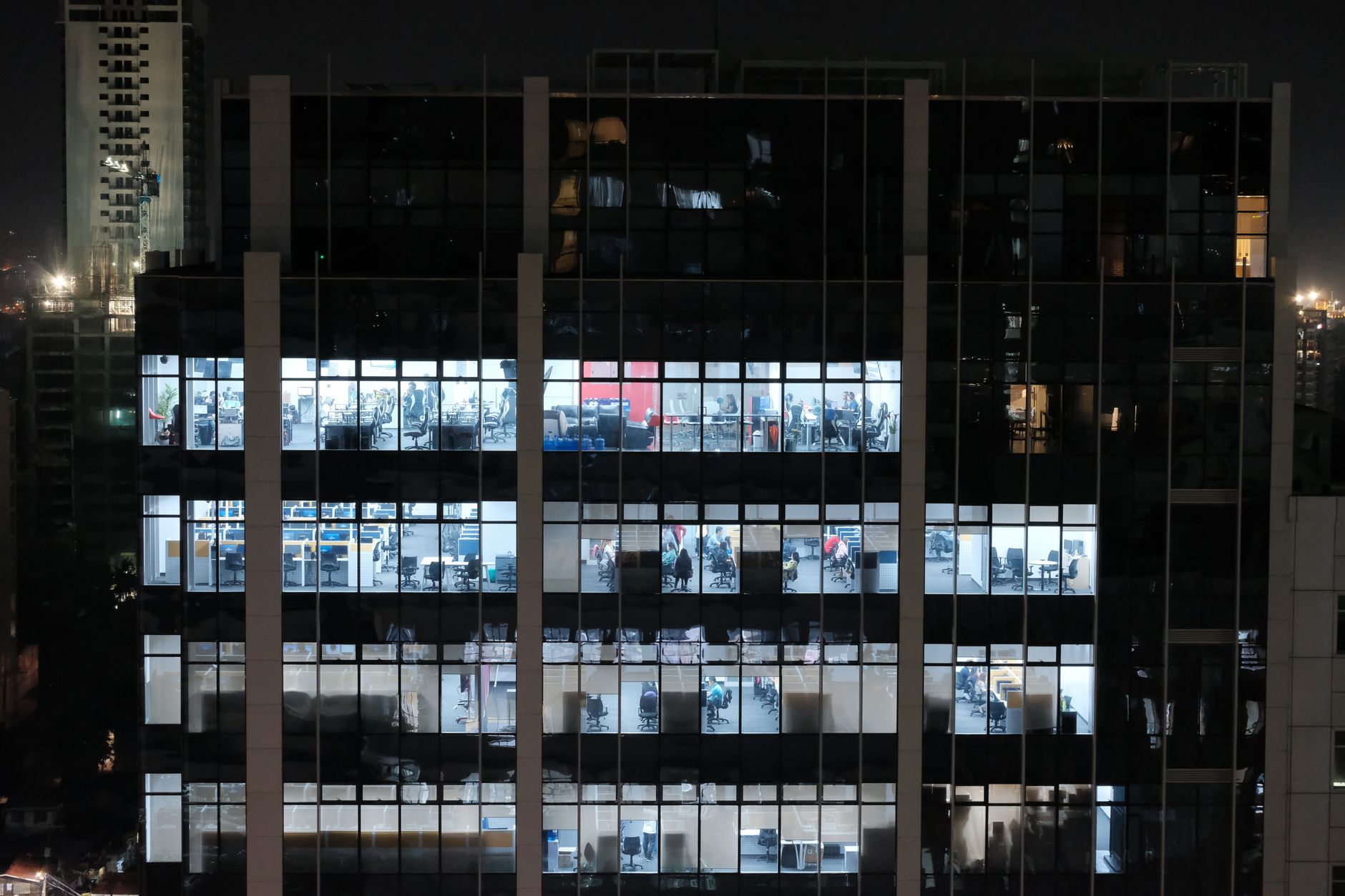 Financial professionals reviewing investment documents in an office setting